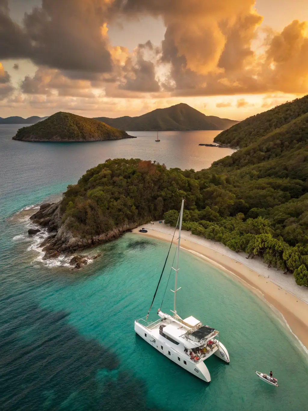 A luxurious catamaran sailing into the sunset in Fiji, with passengers enjoying cocktails and the stunning views of the Pacific Ocean, promoting the relaxation and romance of sunset sailing in Fiji.