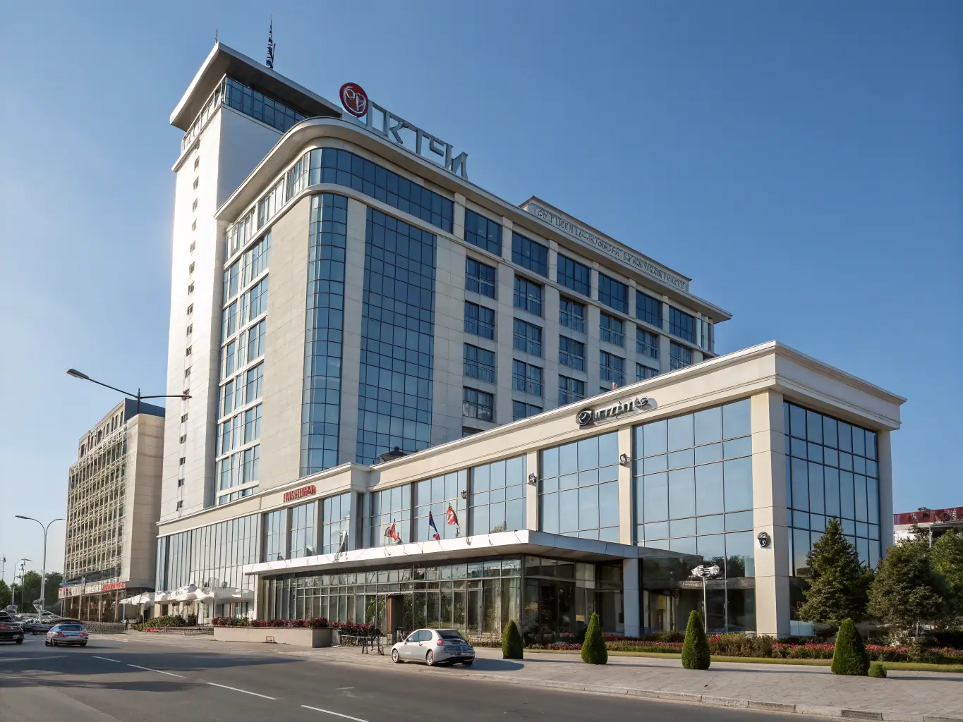 A generic hotel exterior image representing the concept of booking directly with a hotel. The image should convey a sense of independence and potential cost savings.